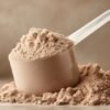A scoop of powder is sitting on a table